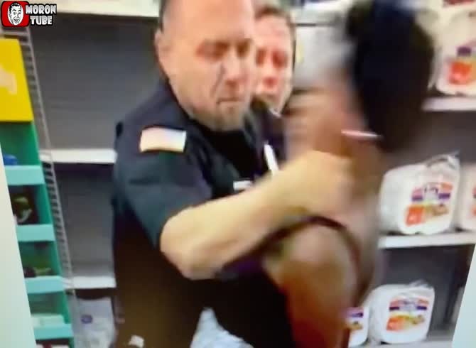 Video :A police officer is shown on camera striking a lady